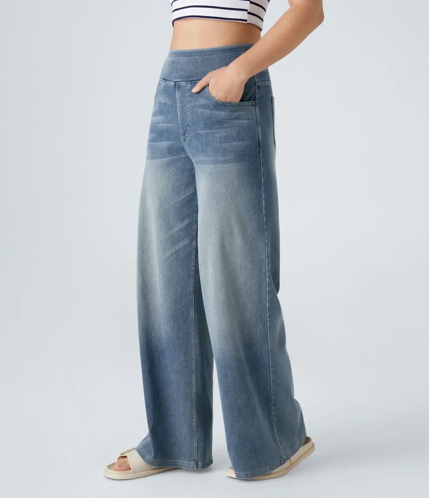 High-waisted elastic trousers