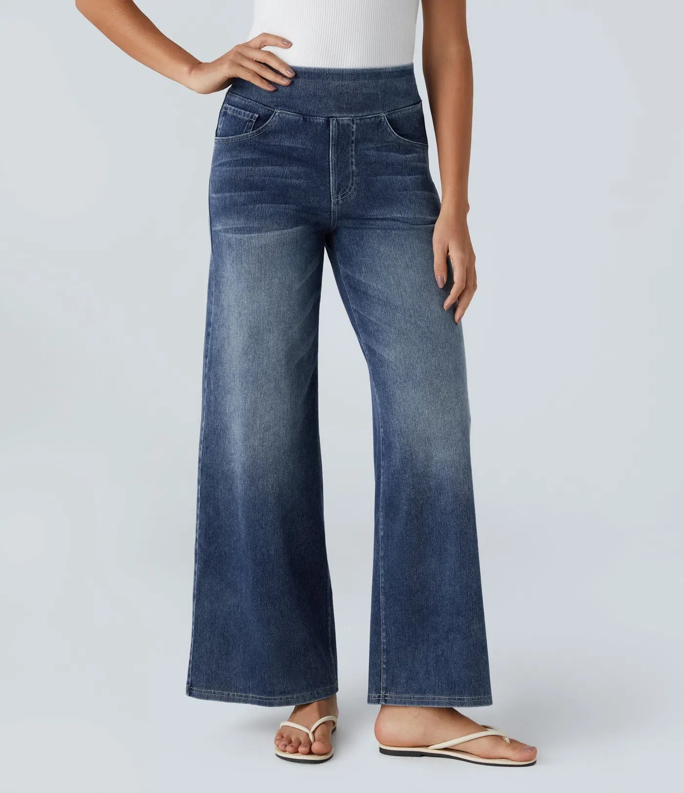 High-waisted elastic trousers